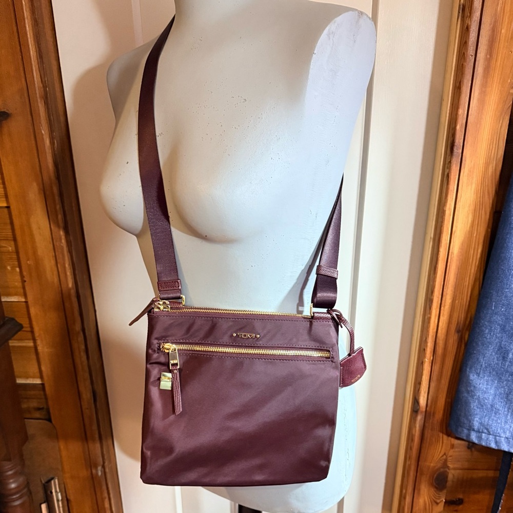 Tumi Plum Tia Voyager Crossbody Bag with Gold Accents - Picture 2 of 7